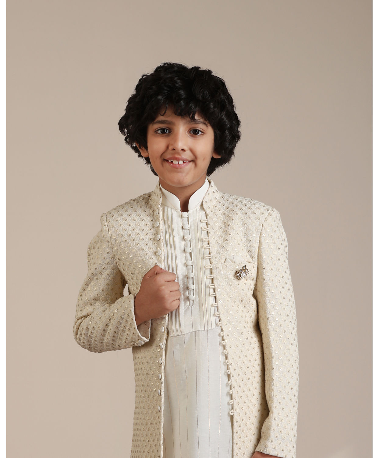 alt message - Manyavar Boys Boys Cream Self Patterned Indo-Western Set with Mirror work image number 0